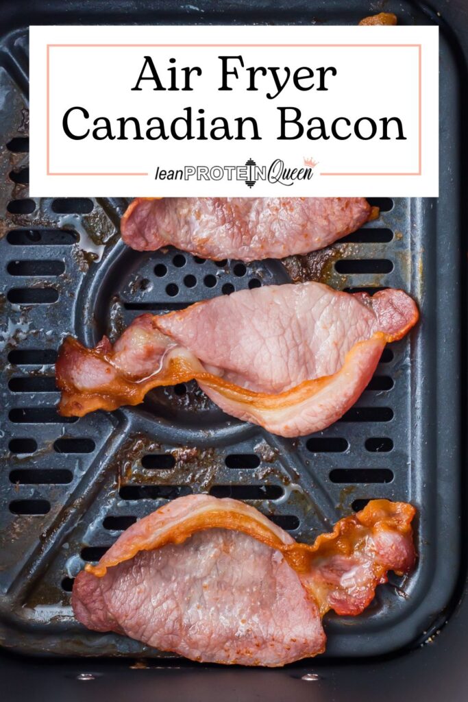 Three slices of air fryer Canadian bacon sit in a basket, with a sign above that reads "Air Fryer Canadian Bacon.