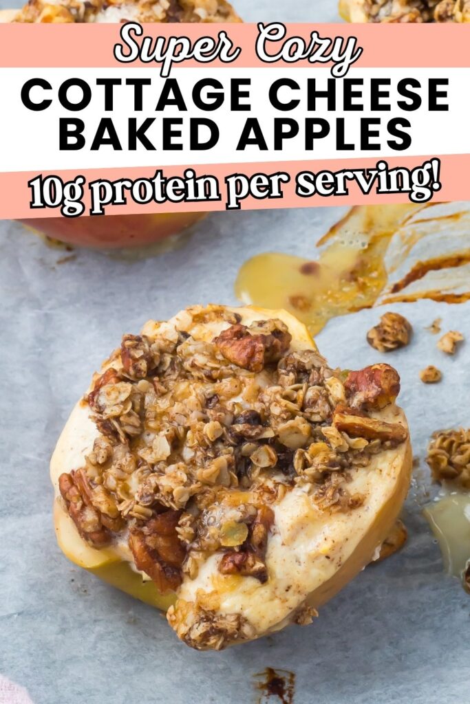 A halved baked apple filled with cottage cheese and crumble sits on parchment paper, with juice and granola scattered around. Text saus "super cozy cottage cheese baked apples, 10g protein per serving!".