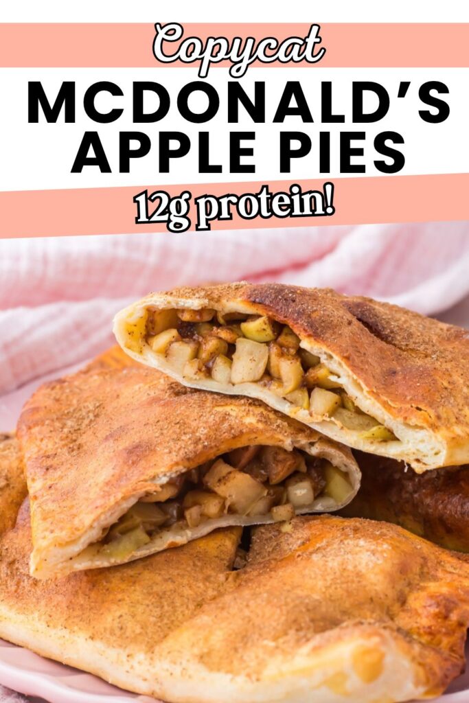 A pile of high-protein, copycat McDonald&rsquo;s apple pies with one cut in half, revealing a diced apple filling. Text above reads &ldquo;Copycat McDonald&rsquo;s Apple Pies, 12g protein!&rdquo;.